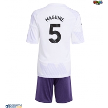 Otroški Nogometni dresi Manchester United Harry Maguire #5 Gostujoči 2025-26 Kratek Rokav (+ Kratke hlače)